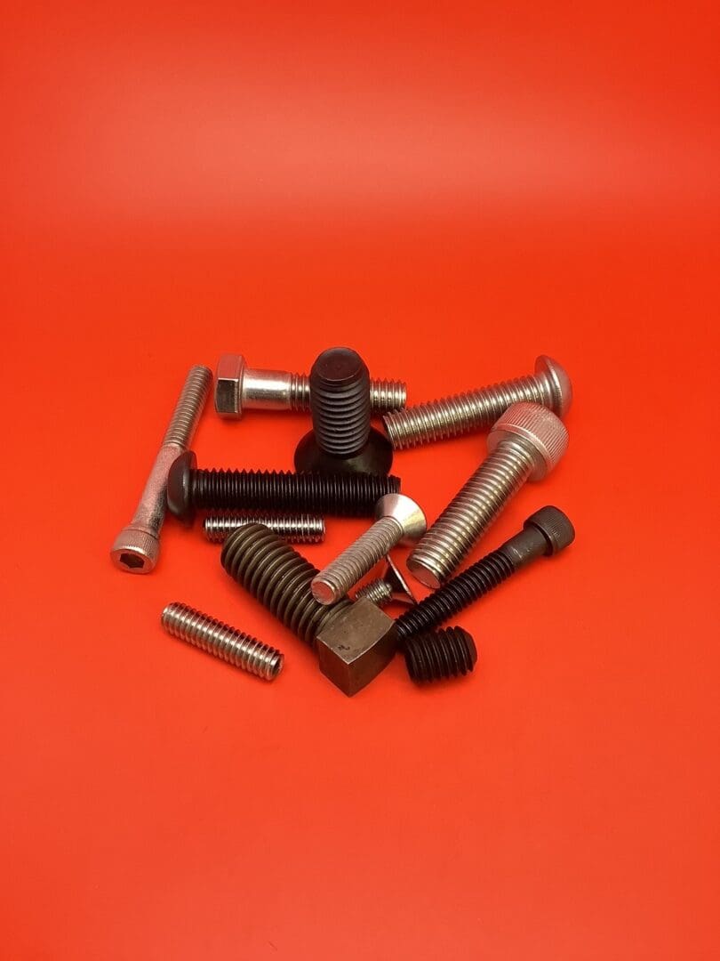 A pile of different types of metal parts.