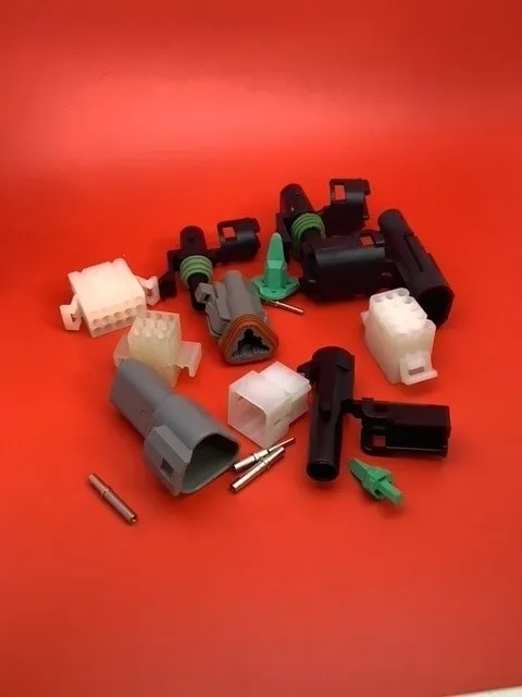 A bunch of different parts are laying on the table