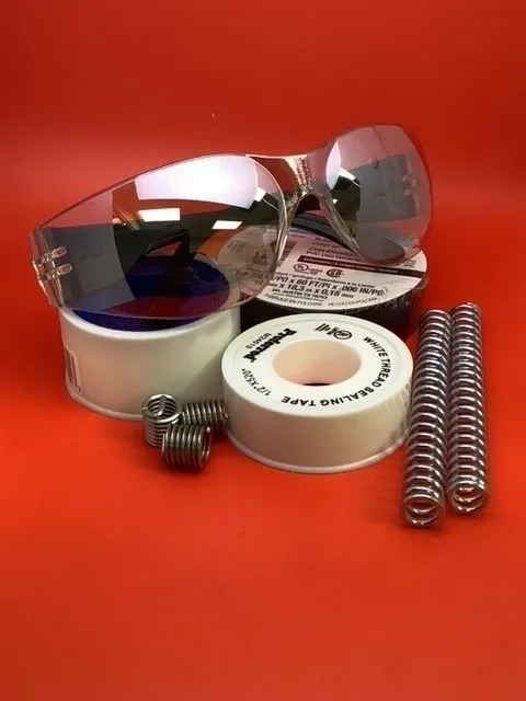 A red table with some glasses and some springs