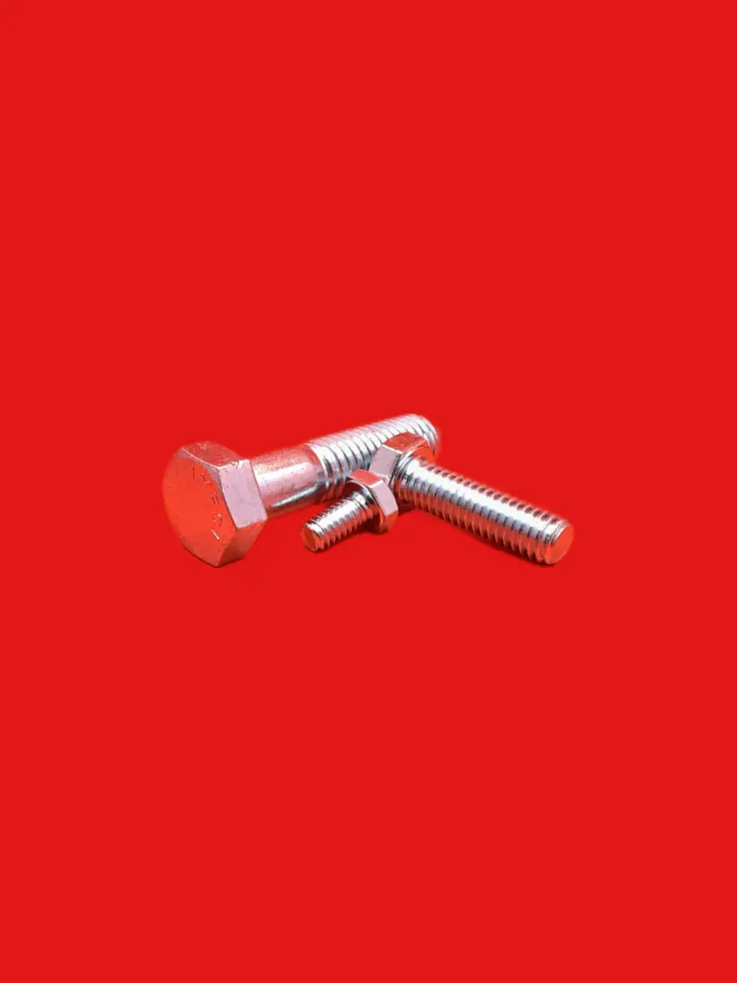 Here's an alt tag for the image: Two metal bolts on red background.