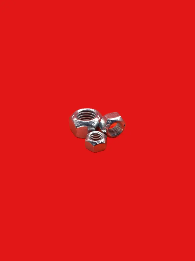 Here's a short alt tag for the image: Three metal nuts on red background.